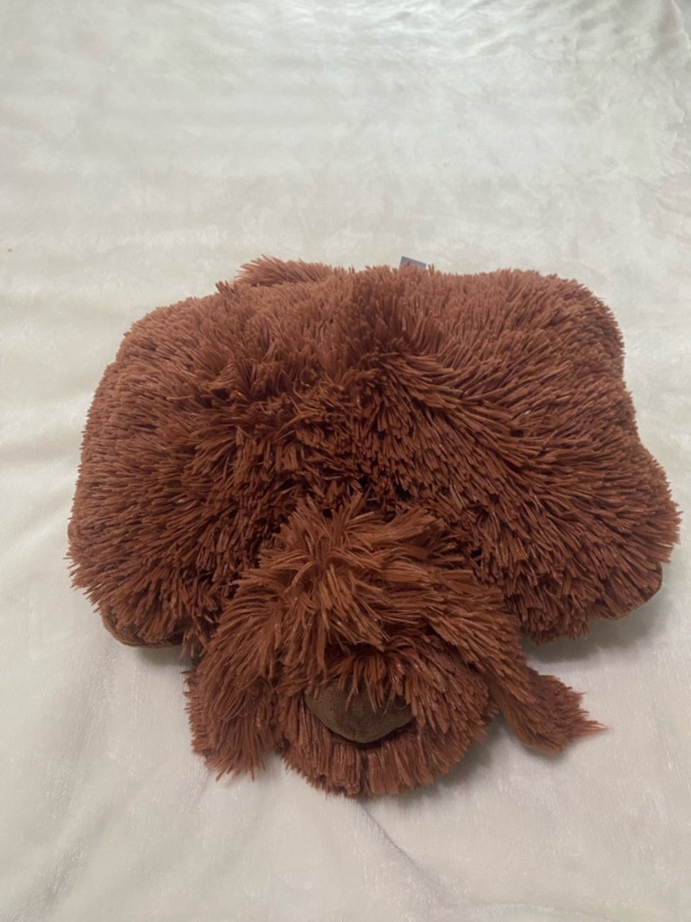 brown pillow pet from the movie “the secret life of pets”